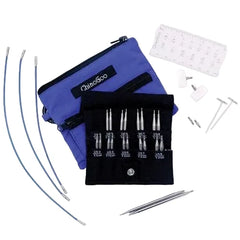 Set of knitting needles with blue case and black pouch on a white background